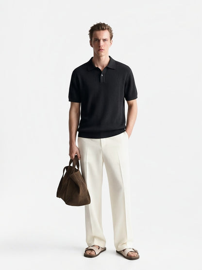 the-amalfi-textured-knit-polo-black-1-front